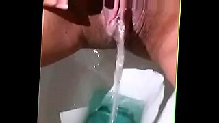 amateur asian chick at home with two guys gets a blowjob